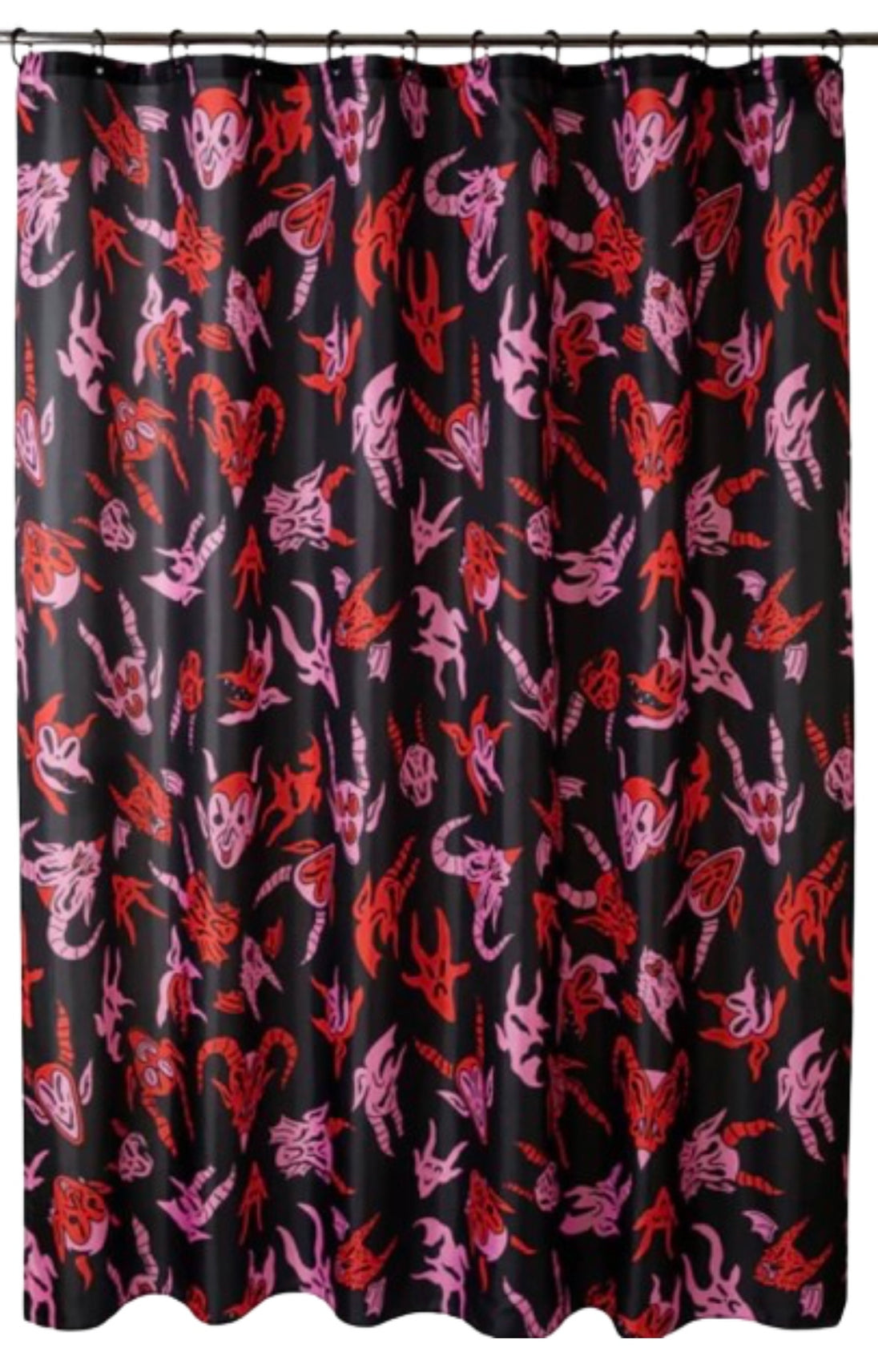 A black shower curtain with red and pink characters on it hanging from a shower rod.