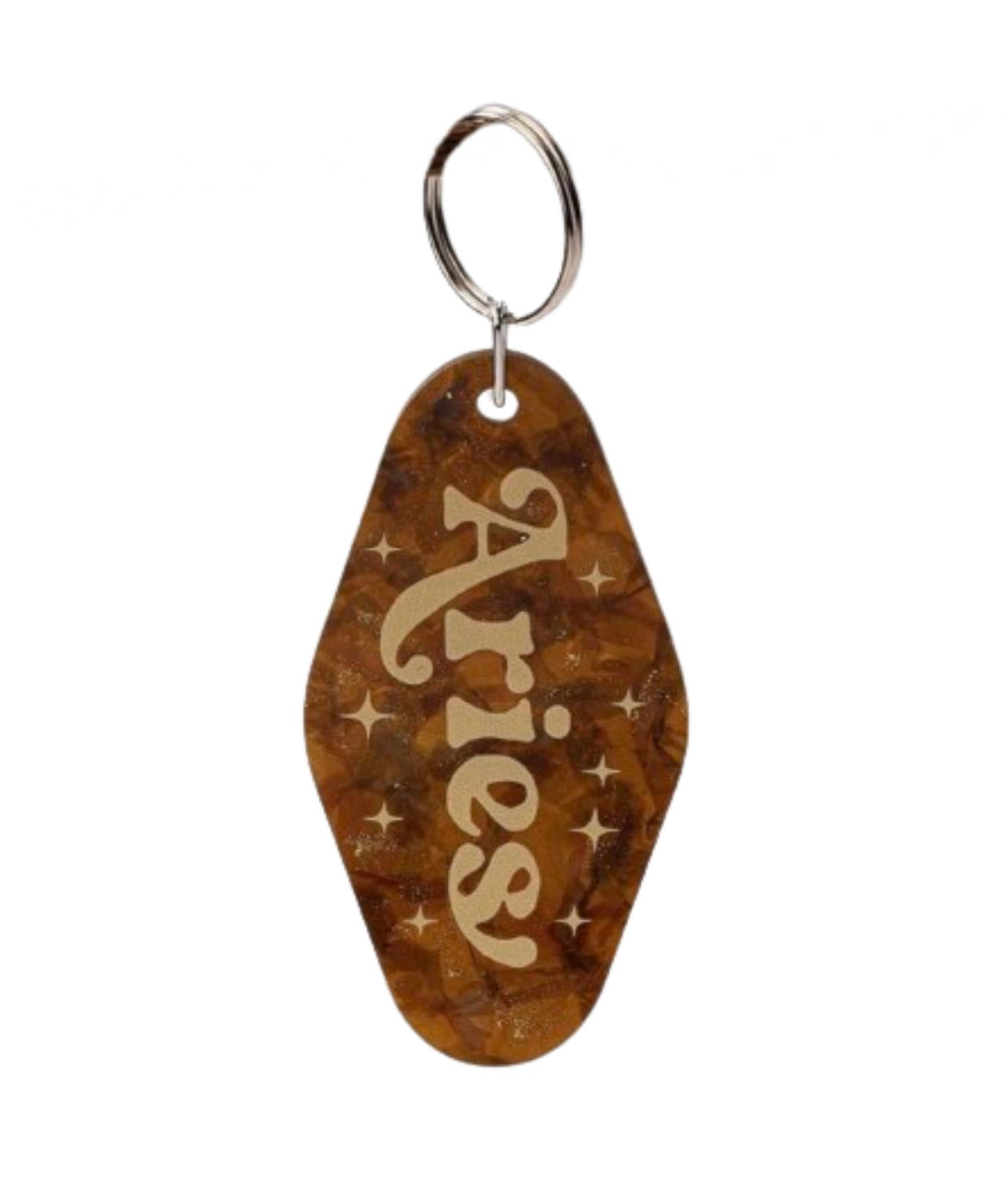 A brown marble keychain with the word “ Aries “ written in gold on it.