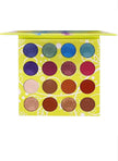 A close-up of the Revelry Eyeshadow Palette which includes sixteen mattes and glam shimmer shades. Colors included in palette are royal blue shimmer, dark brown in shimmer and matte and many others.