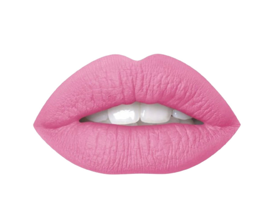 A close up of a woman's lips wearing air matte liquid lipstick in the color of confetti.