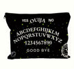 A gothic print makeup bag in black with “ ouija yes no goodbye “ written on it showcased on a white background.