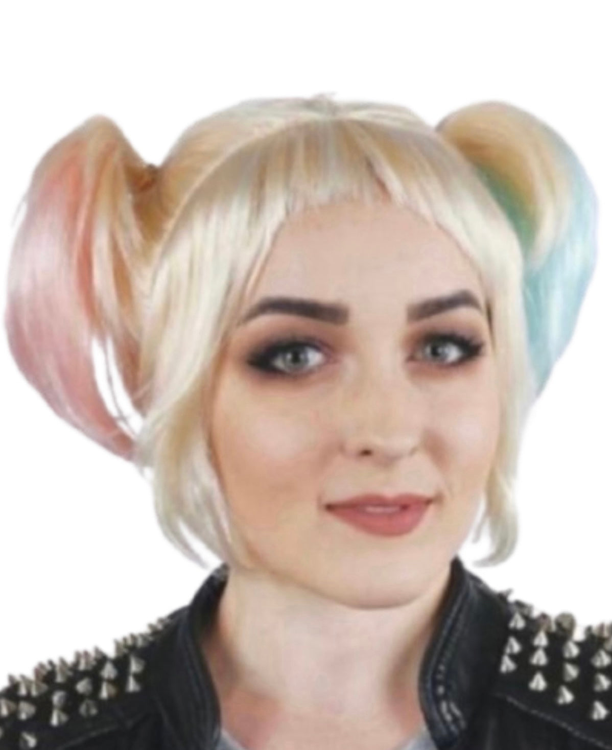 A woman wearing a blonde wig with two pigtails with pink and blue tips and blonde bangs.