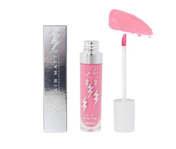 A clear tube with lightning bolts on it of the Air Matte Liquid Lipstick in the color confetti standing next to a silvery box with lightning bolts on it.