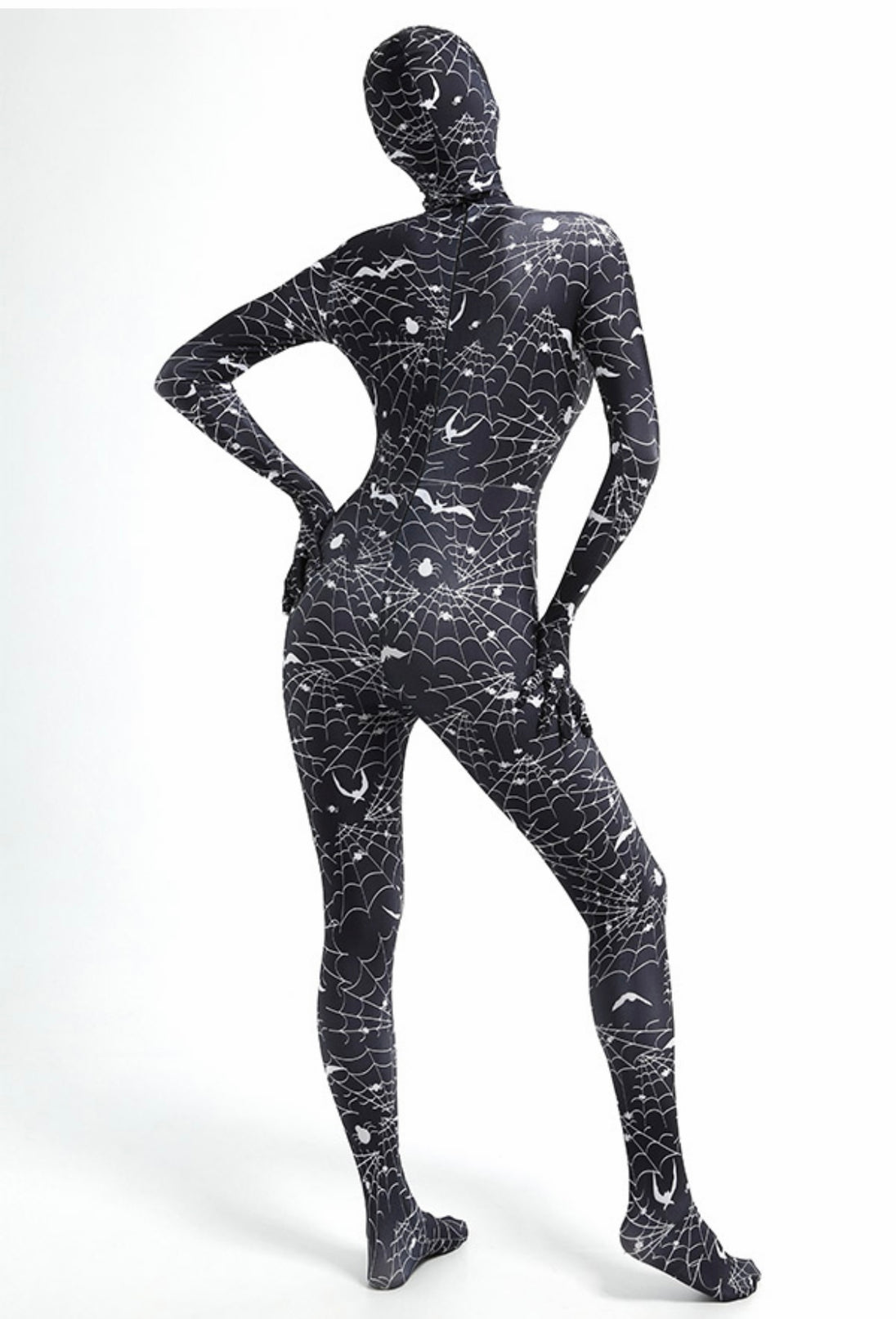 A model posing from the back wearing a spider web full body bodysuit in black and a full head mask.
