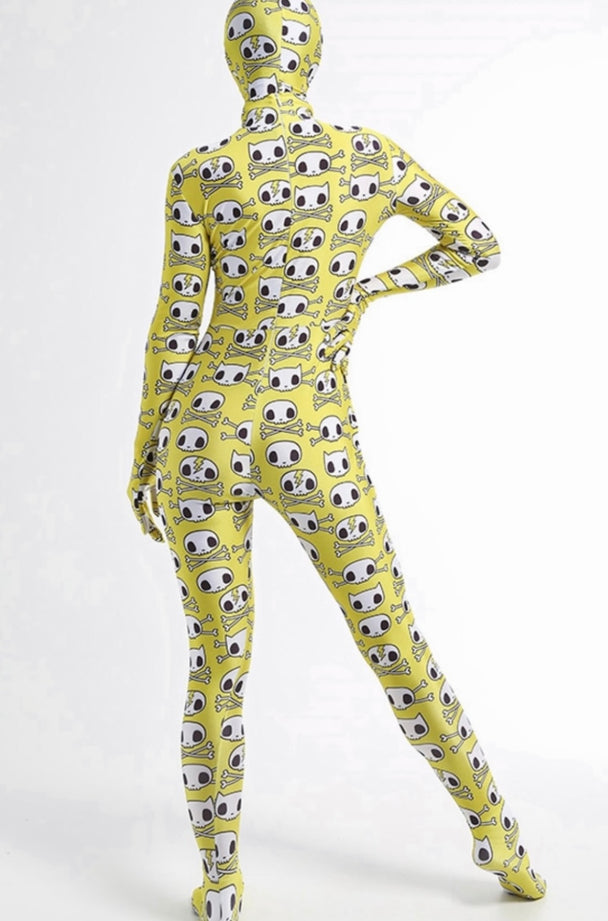 A model wearing a yellow skeleton full body bodysuit with a head cover.