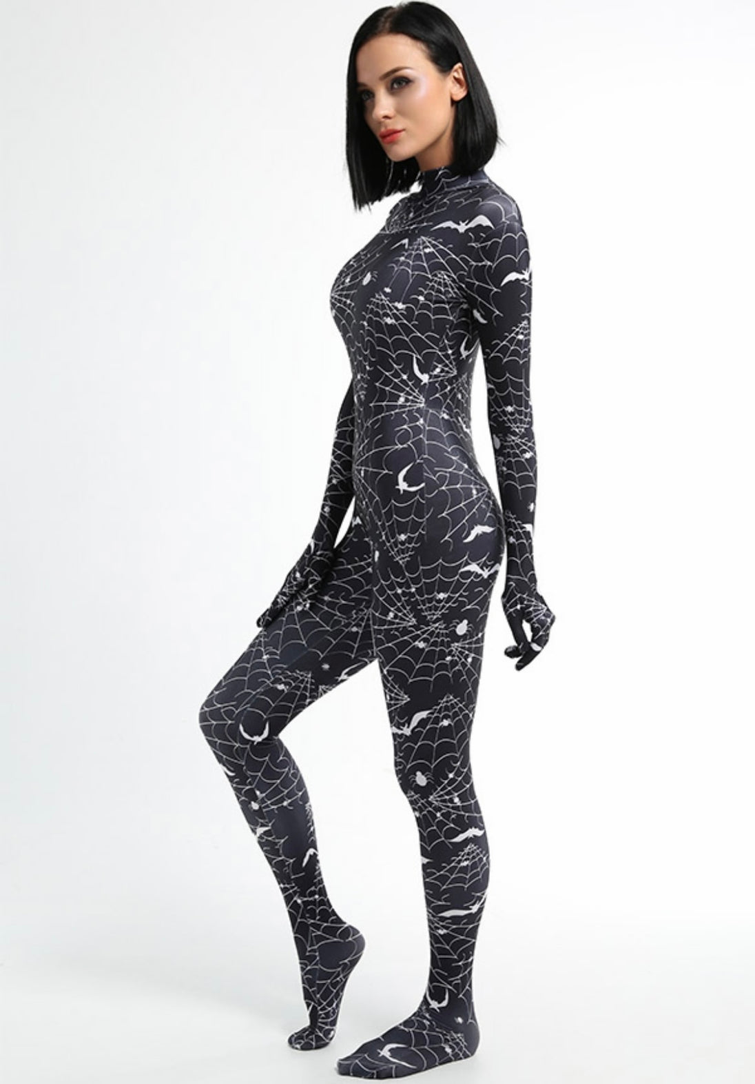 A female posing sideways wearing a spider web full body bodysuit in black without the full head mask.