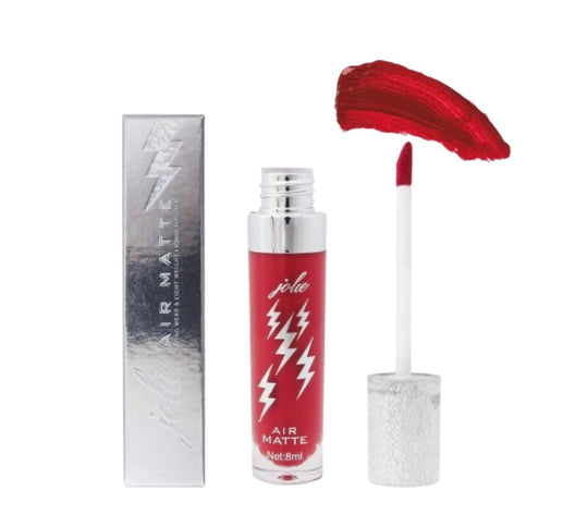 A clear tube with lightning bolts on it of the Air Matte Liquid Lipstick in the color chili pepper standing next to a silvery box with lightning bolts on it.