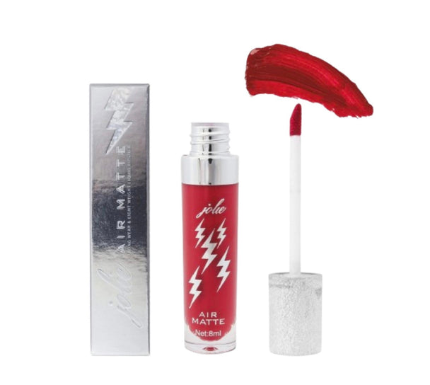 A clear tube with lightning bolts on it of the Air Matte Liquid Lipstick in the color chili pepper standing next to a silvery box with lightning bolts on it.