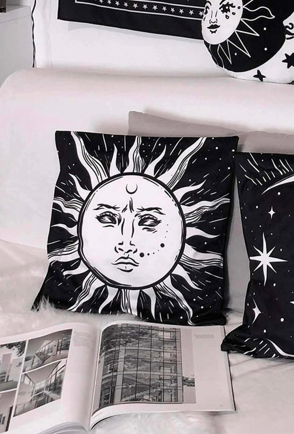 Black pillow cushion with a white sun.