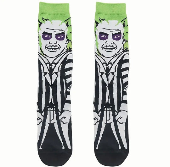 Beetle Juice Socks. Black socks with a green stripe and beetle juice pattern. Perfect for fans of the movie or insect enthusiasts.