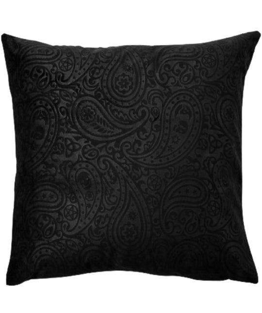 A black pillow cushion with a paisley design on it.