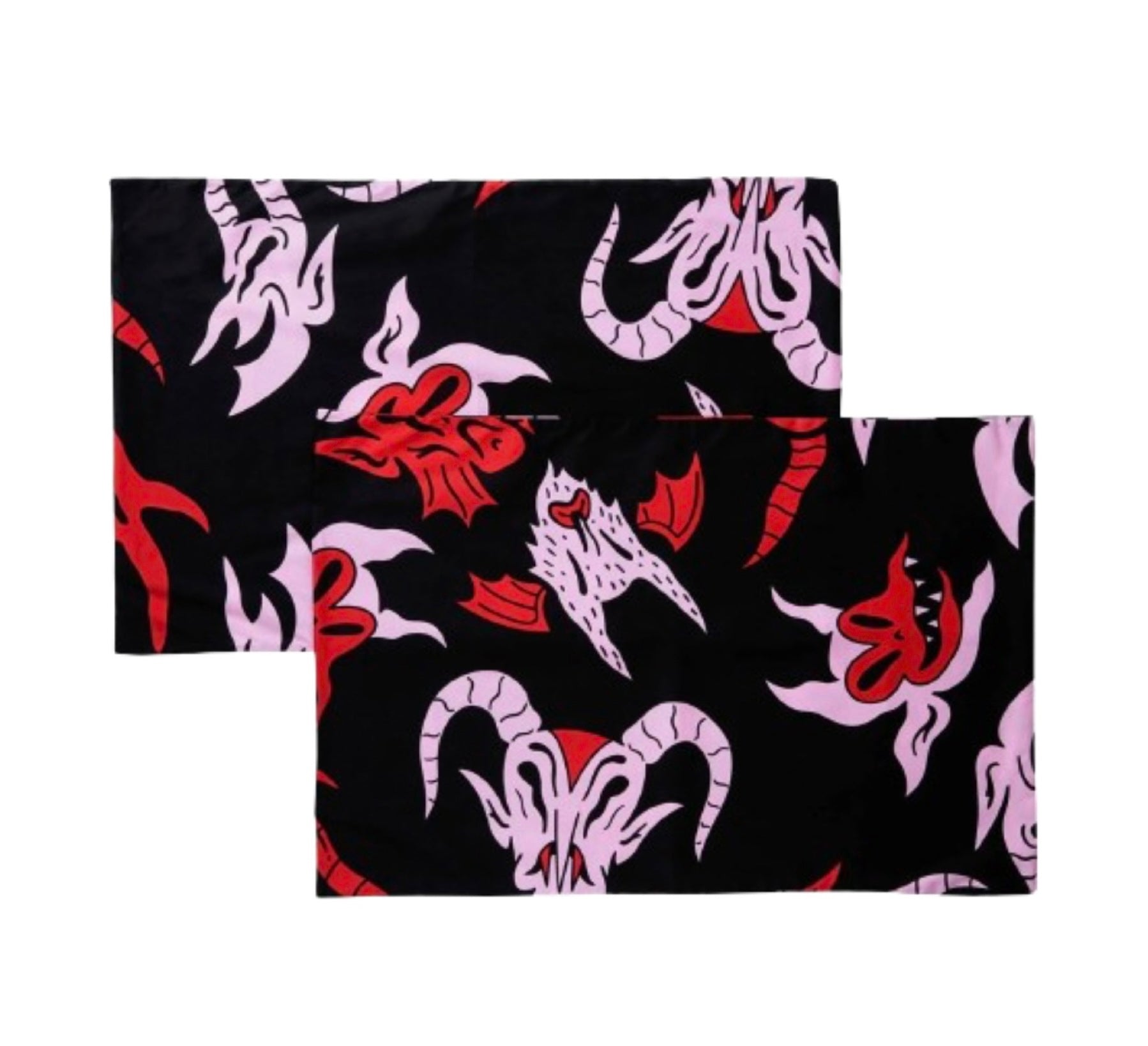 A pair of black pillowcases with pink and red characters.