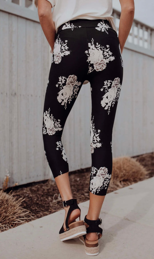 Black and white floral print capri leggings for yoga, workout or lounging.